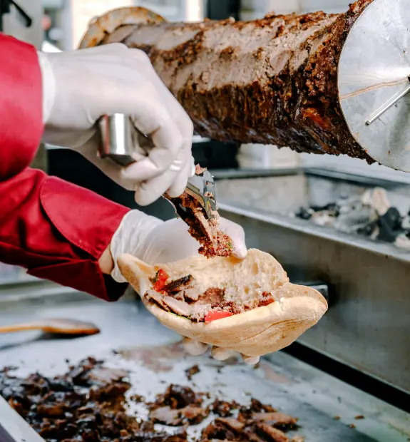 Pita Pit sandwich preparation